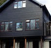Roth-Lap Composite Cladding installed on the front of an house