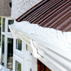 Ogee guttering on a house, brand is Floplast