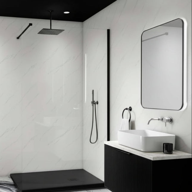 Modern bathroom with black and white color scheme, featuring a shower area and vanity.