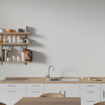 Modern kitchen with wooden shelves and countertop and a gloss white wall
