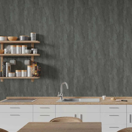 Modern kitchen with wooden shelves, sink, and countertop against a gray wall.