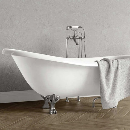 Misty Stone PVC Maxi Panel Wall Panel behind White freestanding bathtub with chrome fixtures against a gray wall.