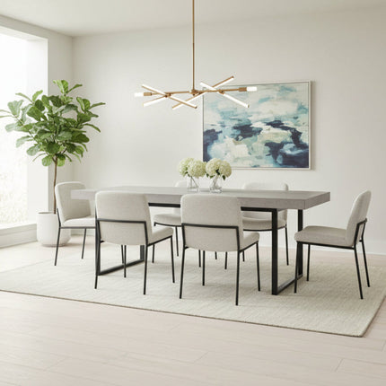 Light Flooring in a Modern dining room with a table and chairs, large window, and abstract painting on the wall.