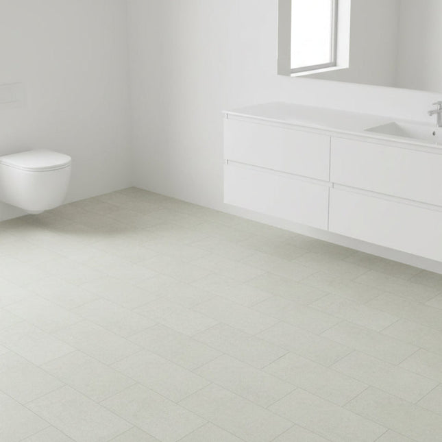 Bathroom with light tiled floor, featuring a sink and toilet.